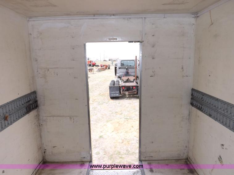 image for item F6492 2000 Freightliner FL60 semi truck