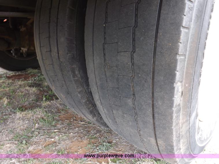 image for item F6492 2000 Freightliner FL60 semi truck