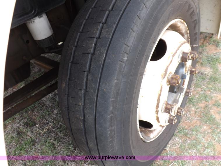 image for item F6492 2000 Freightliner FL60 semi truck