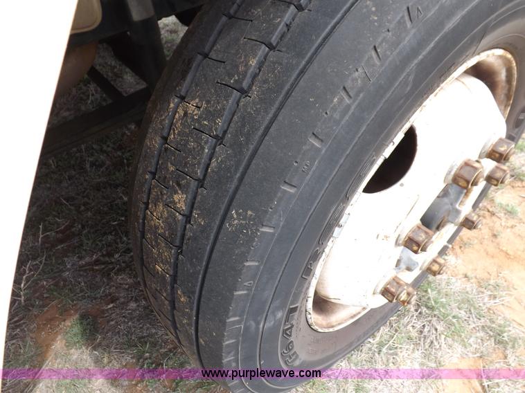 image for item F6492 2000 Freightliner FL60 semi truck