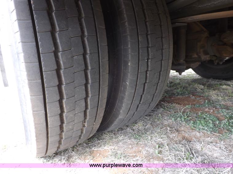 image for item F6492 2000 Freightliner FL60 semi truck