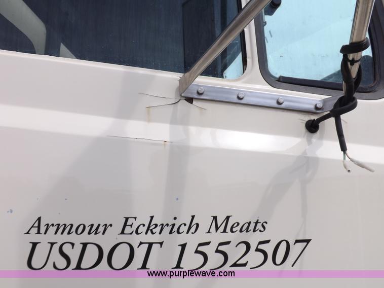 image for item F6492 2000 Freightliner FL60 semi truck