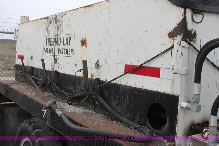 image for item AA9083 1982 Ford F600 pot hole patching truck