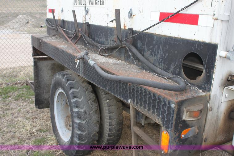 image for item AA9083 1982 Ford F600 pot hole patching truck