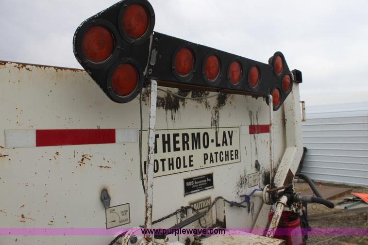 image for item AA9083 1982 Ford F600 pot hole patching truck