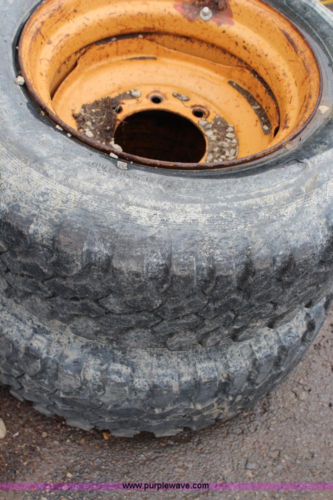 image for item AJ9540 (5) Case skid steer wheels and tires