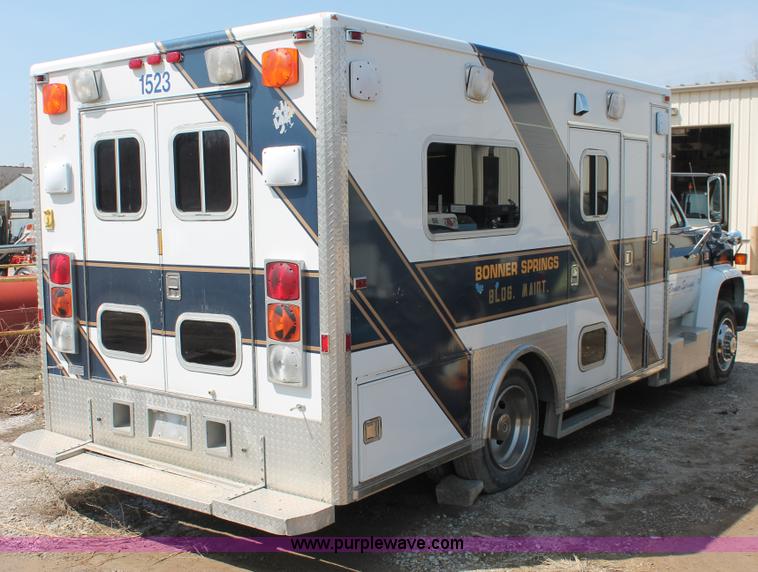 image for item E3335 1989 GMC TopKick 7000 EMS building maintenance truck