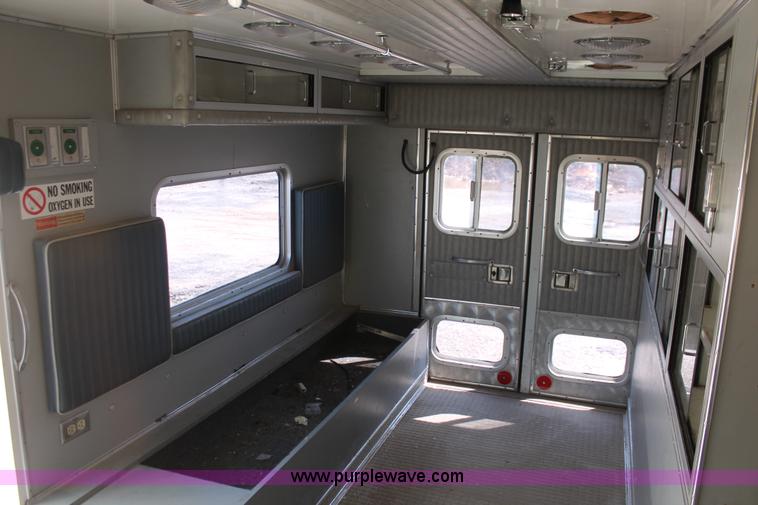 image for item E3335 1989 GMC TopKick 7000 EMS building maintenance truck