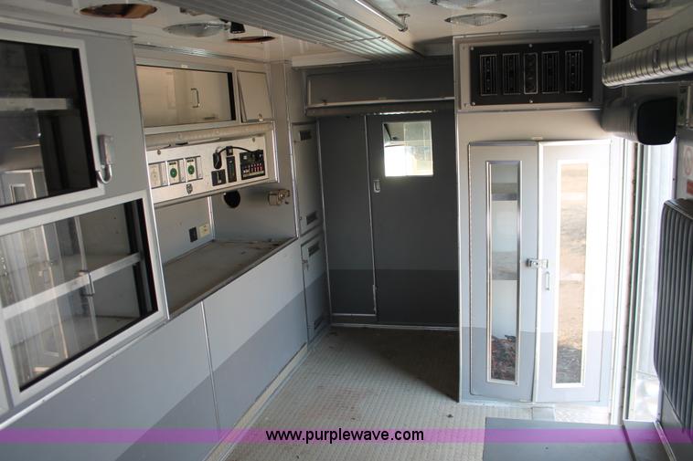 image for item E3335 1989 GMC TopKick 7000 EMS building maintenance truck