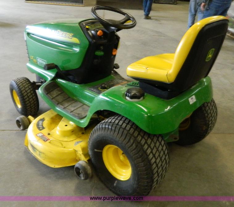 image for item W9030 John Deere LT180 lawn mower