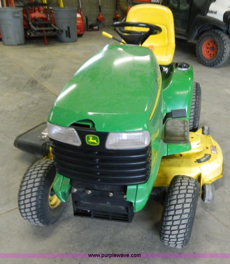image for item W9030 John Deere LT180 lawn mower