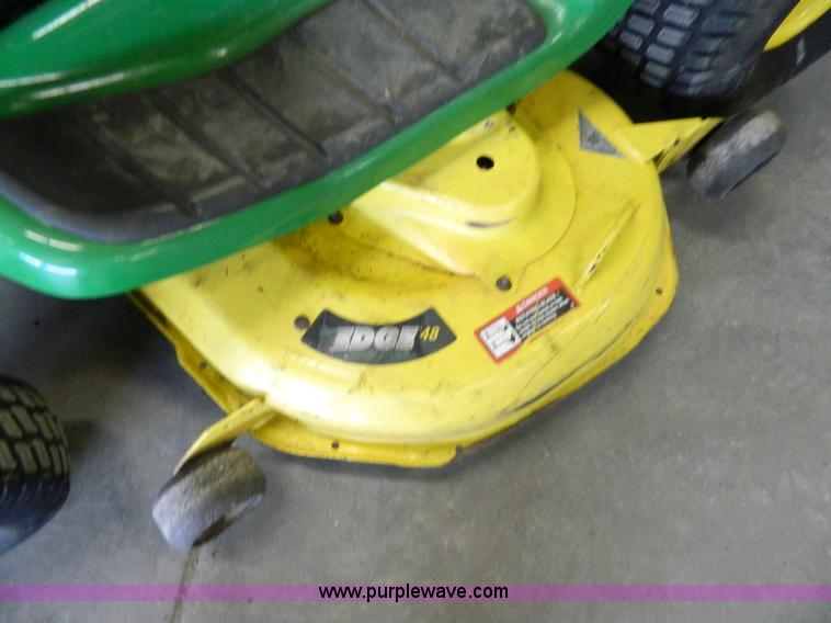 image for item W9030 John Deere LT180 lawn mower
