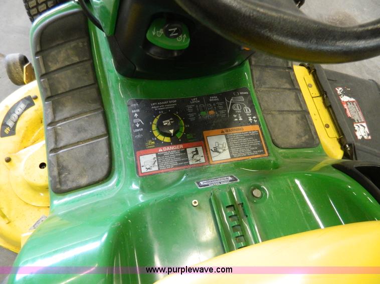 image for item W9030 John Deere LT180 lawn mower