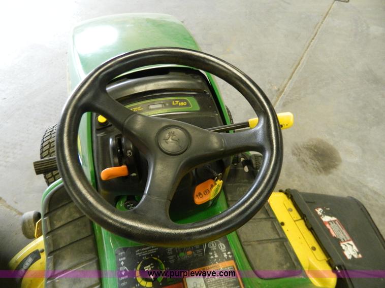 image for item W9030 John Deere LT180 lawn mower