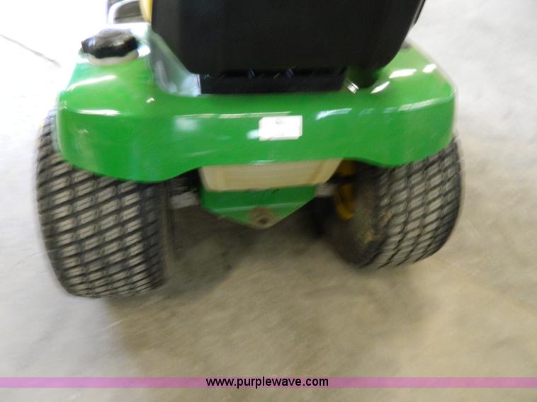 image for item W9030 John Deere LT180 lawn mower