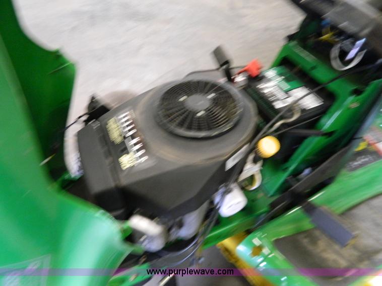 image for item W9030 John Deere LT180 lawn mower