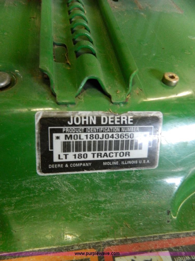 image for item W9030 John Deere LT180 lawn mower