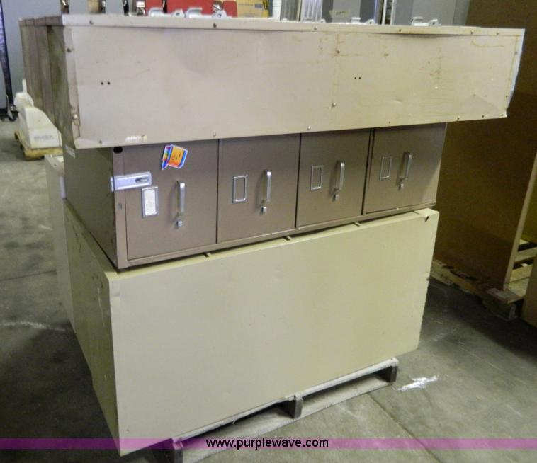 image for item Y9370 (4) four drawer file cabinets