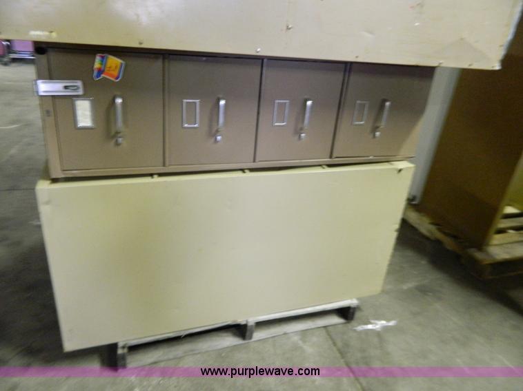 image for item Y9370 (4) four drawer file cabinets