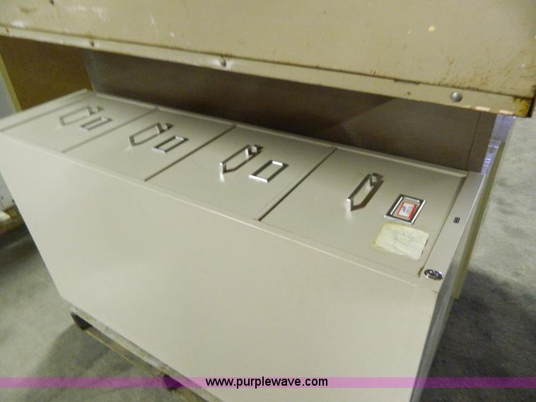 image for item Y9370 (4) four drawer file cabinets