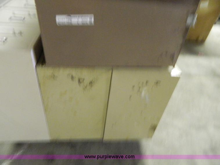 image for item Y9370 (4) four drawer file cabinets