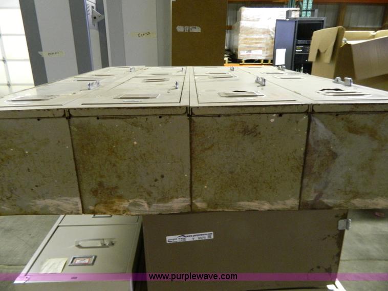 image for item Y9370 (4) four drawer file cabinets