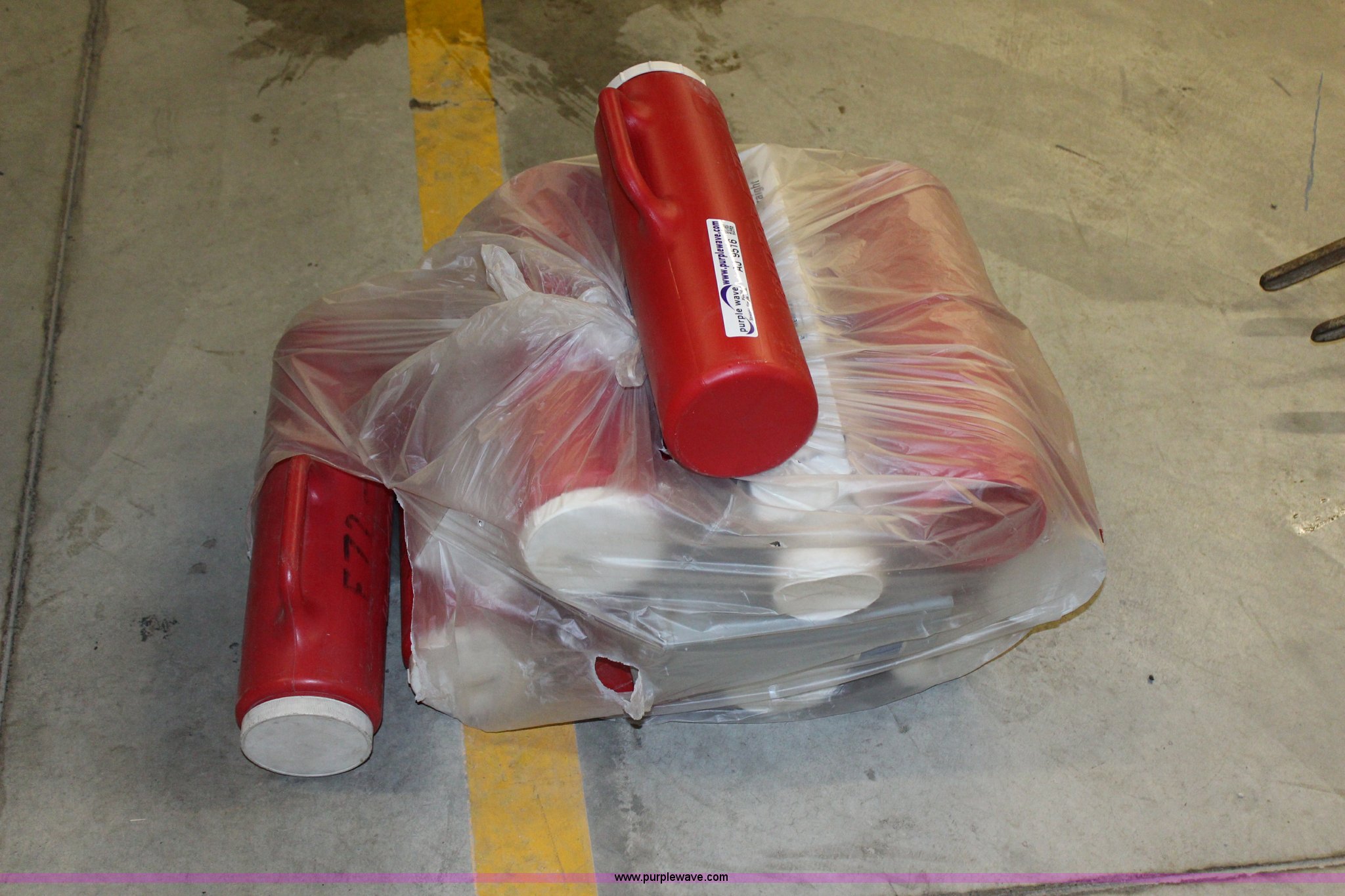 (10) plastic flare containers in Topeka, KS Item AJ9516 sold Purple