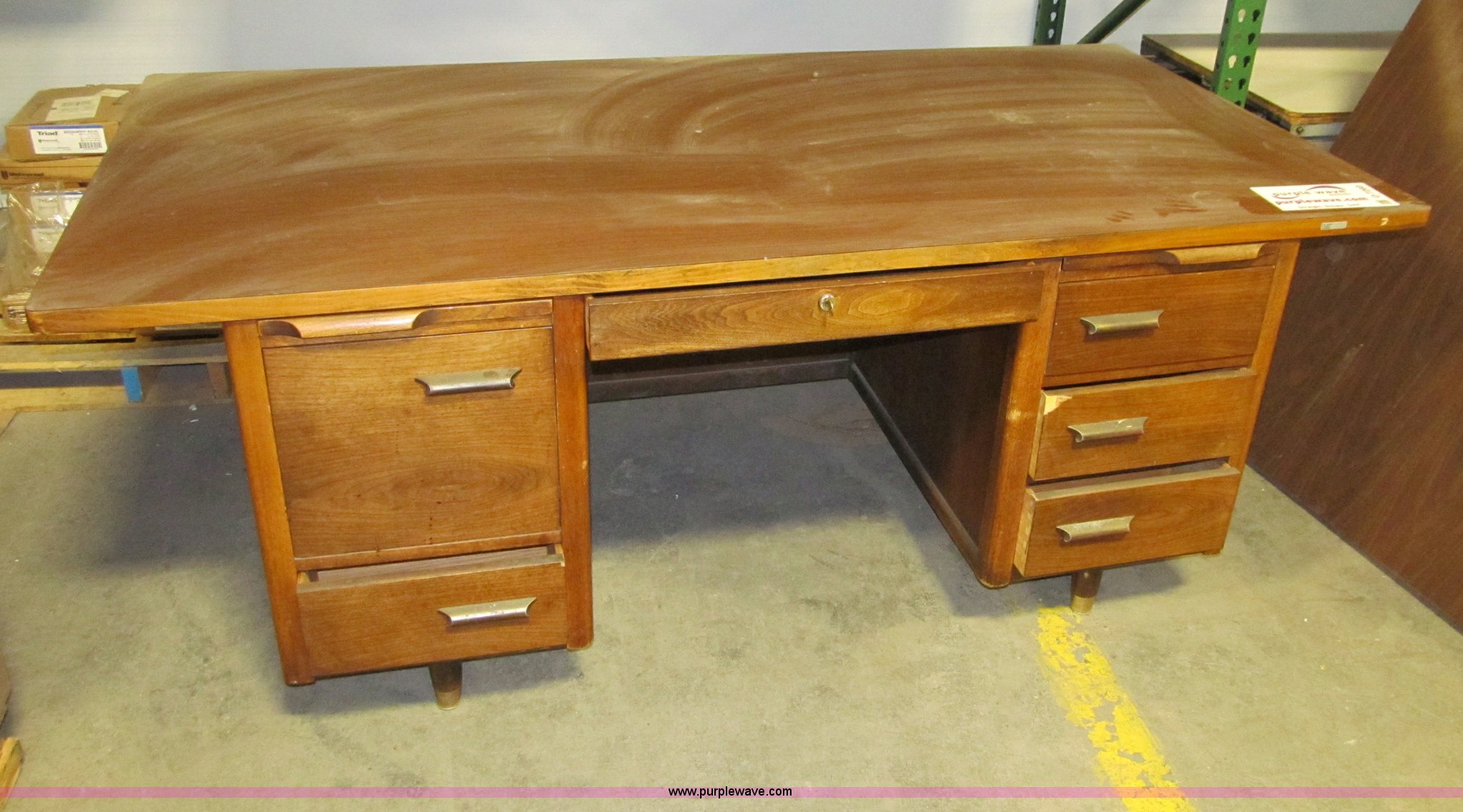 Wood desk in Des Moines, IA Item D7260 sold Purple Wave
