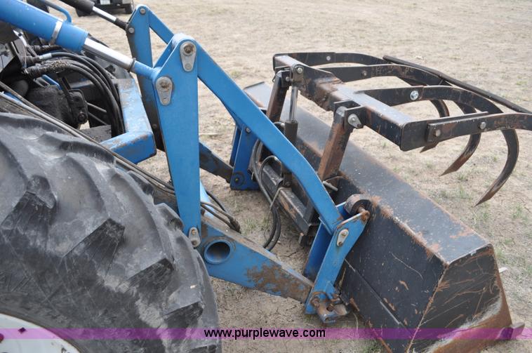 image for item C3493 1989 Ford 276 Versatile articulated tractor