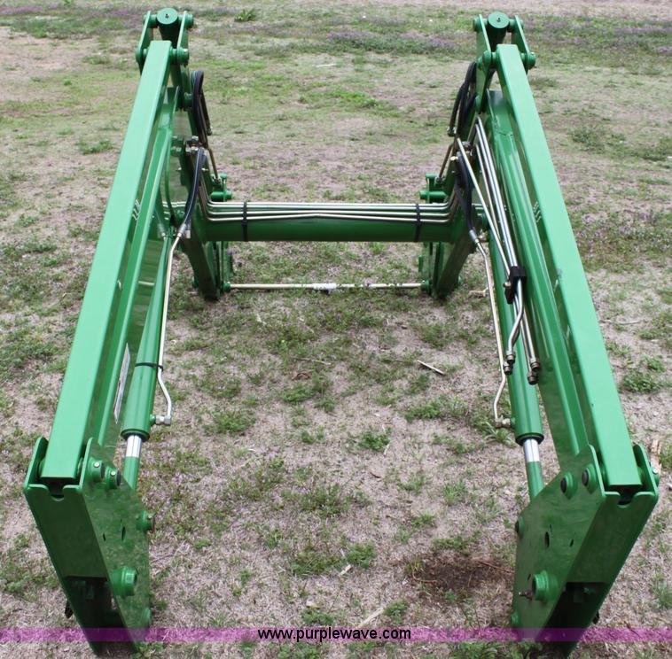 image for item F8670 John Deere 542 loader