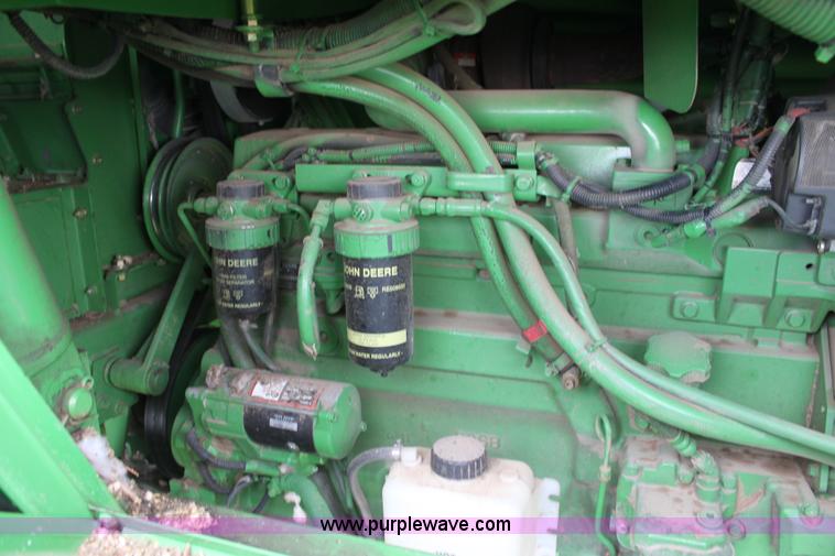 image for item F8680 2006 John Deere 7460 Mudhog cotton stripper