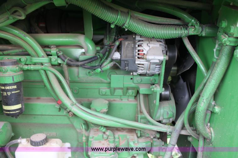 image for item F8680 2006 John Deere 7460 Mudhog cotton stripper