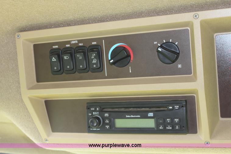 image for item F8681 2006 John Deere 7460 Mudhog cotton stripper