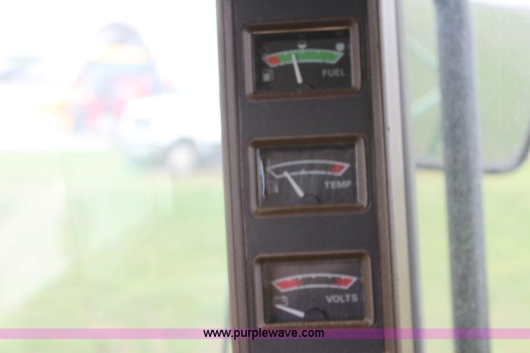 image for item F8681 2006 John Deere 7460 Mudhog cotton stripper