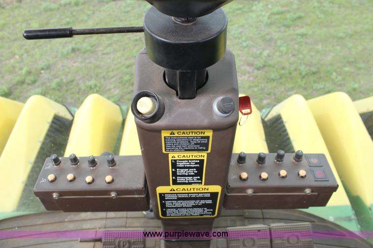 image for item F8681 2006 John Deere 7460 Mudhog cotton stripper