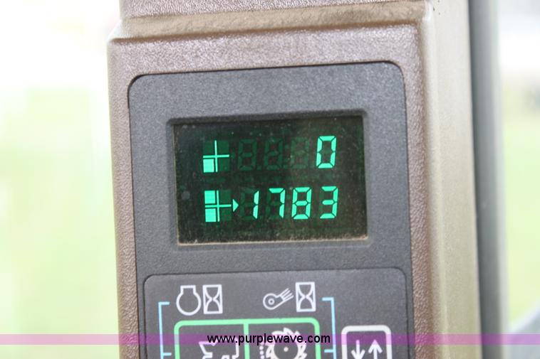 image for item F8681 2006 John Deere 7460 Mudhog cotton stripper