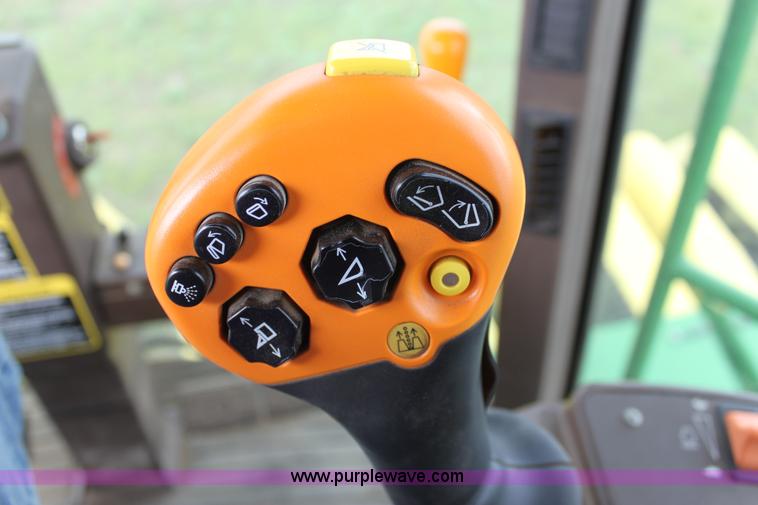 image for item F8681 2006 John Deere 7460 Mudhog cotton stripper