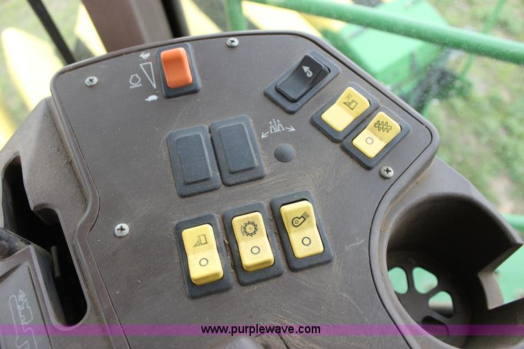 image for item F8681 2006 John Deere 7460 Mudhog cotton stripper