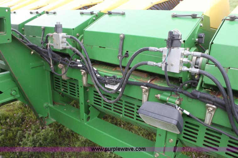 image for item F8681 2006 John Deere 7460 Mudhog cotton stripper