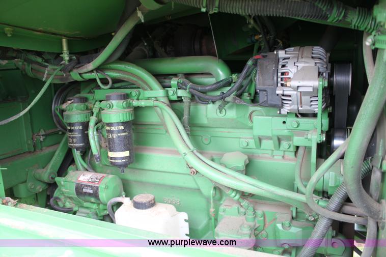 image for item F8681 2006 John Deere 7460 Mudhog cotton stripper