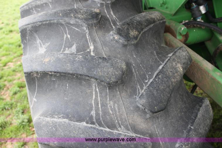 image for item F8681 2006 John Deere 7460 Mudhog cotton stripper