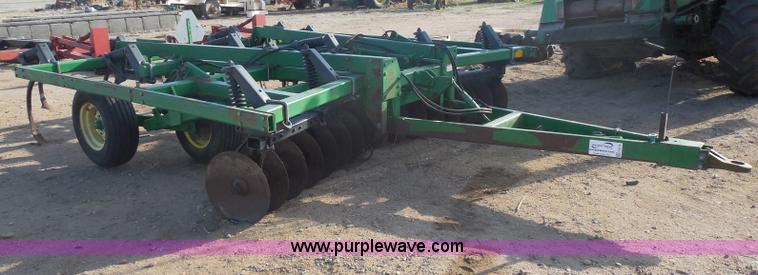 image for item F8775 John Deere 12' disk with spring tooth attachment