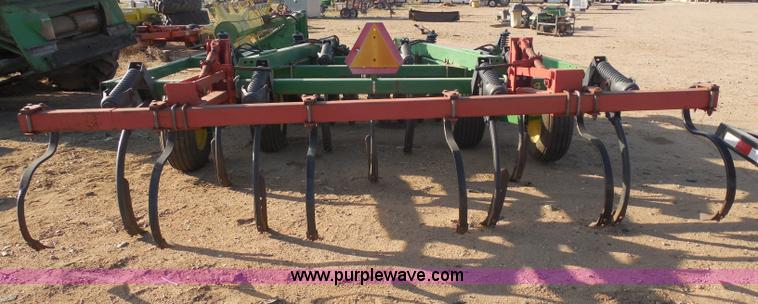 image for item F8775 John Deere 12' disk with spring tooth attachment