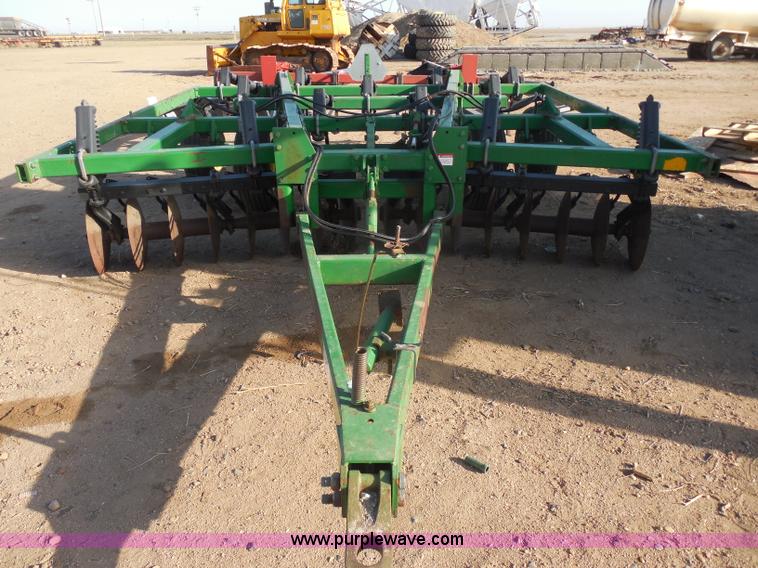 image for item F8775 John Deere 12' disk with spring tooth attachment