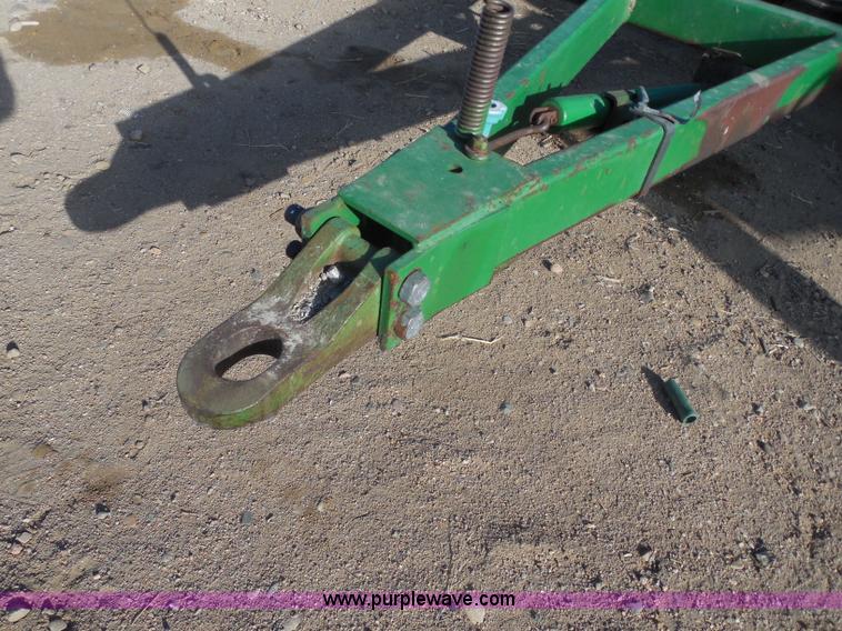 image for item F8775 John Deere 12' disk with spring tooth attachment