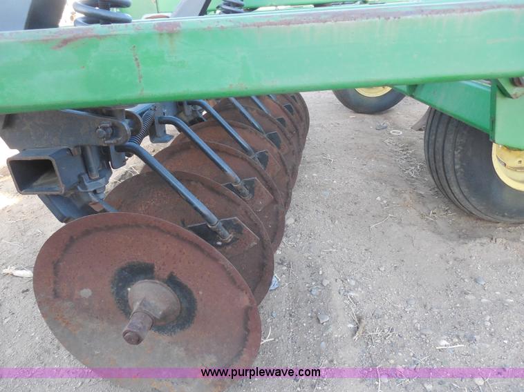 image for item F8775 John Deere 12' disk with spring tooth attachment