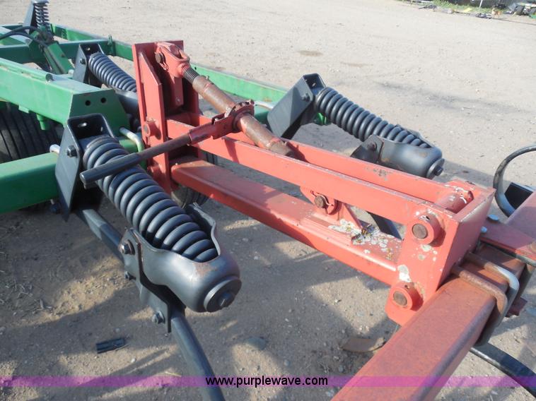 image for item F8775 John Deere 12' disk with spring tooth attachment
