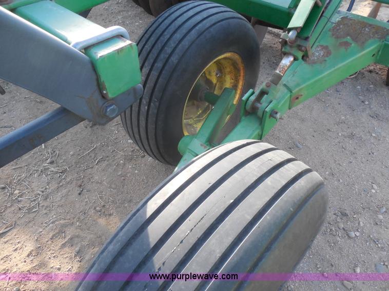image for item F8775 John Deere 12' disk with spring tooth attachment