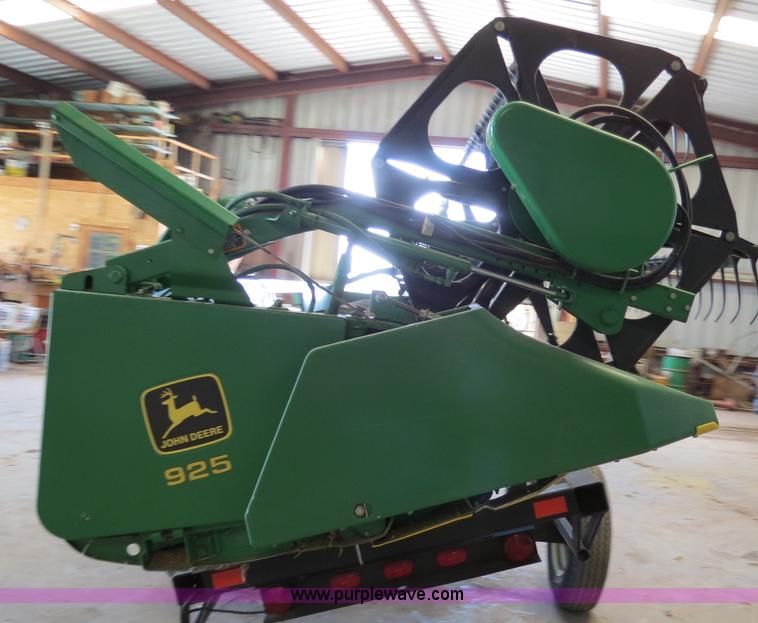 image for item B4730 1998 John Deere 925 25' flex platform header with 2011 Golden Belt header trailer