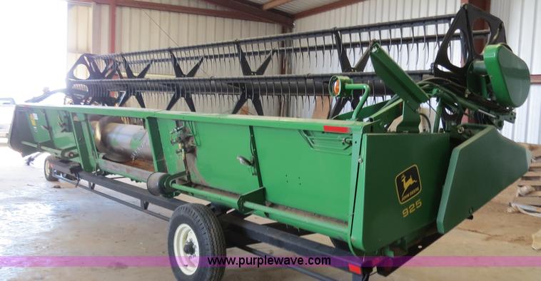 image for item B4730 1998 John Deere 925 25' flex platform header with 2011 Golden Belt header trailer